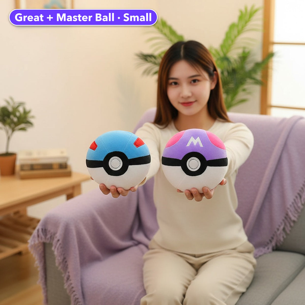 Legends Ball Cushion lifestyle - Great Ball and Master Ball held in each hand